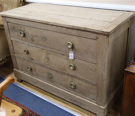 A 19th century French bleached oak commode